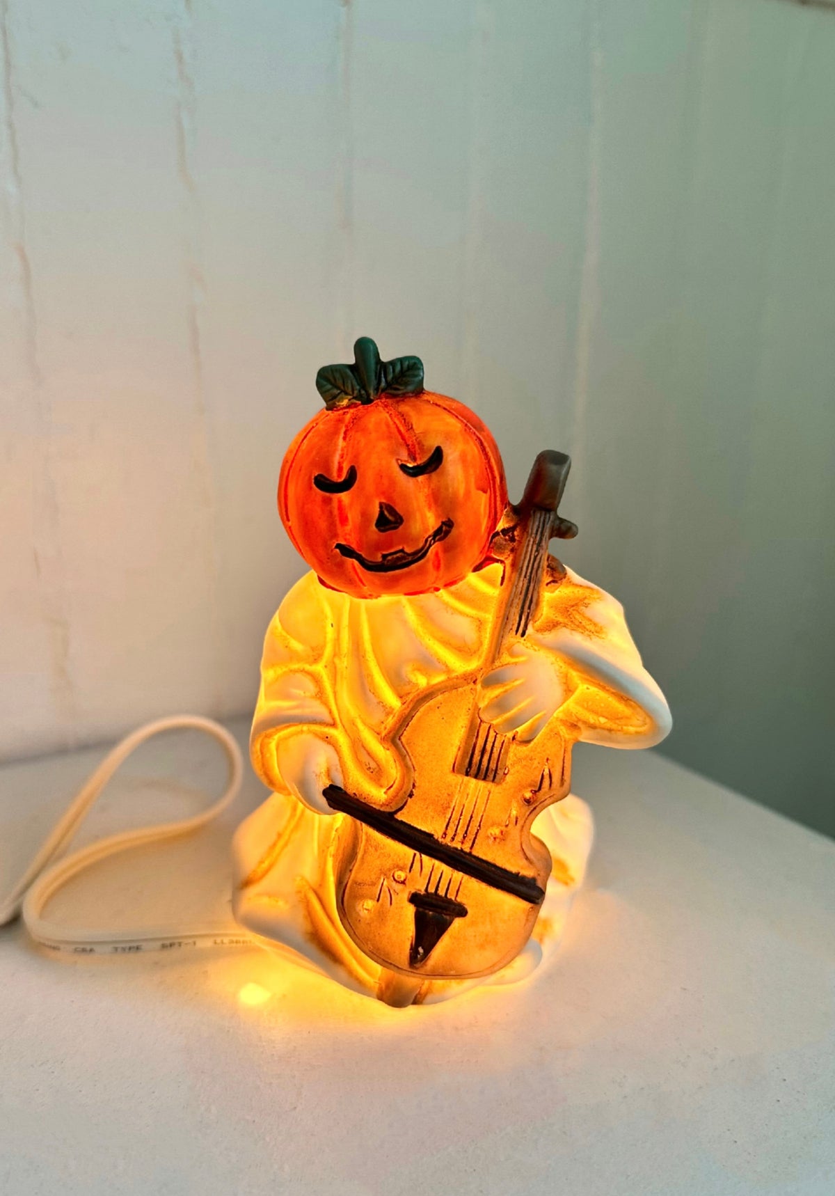Vintage Pumpkin Playing the Cello Light